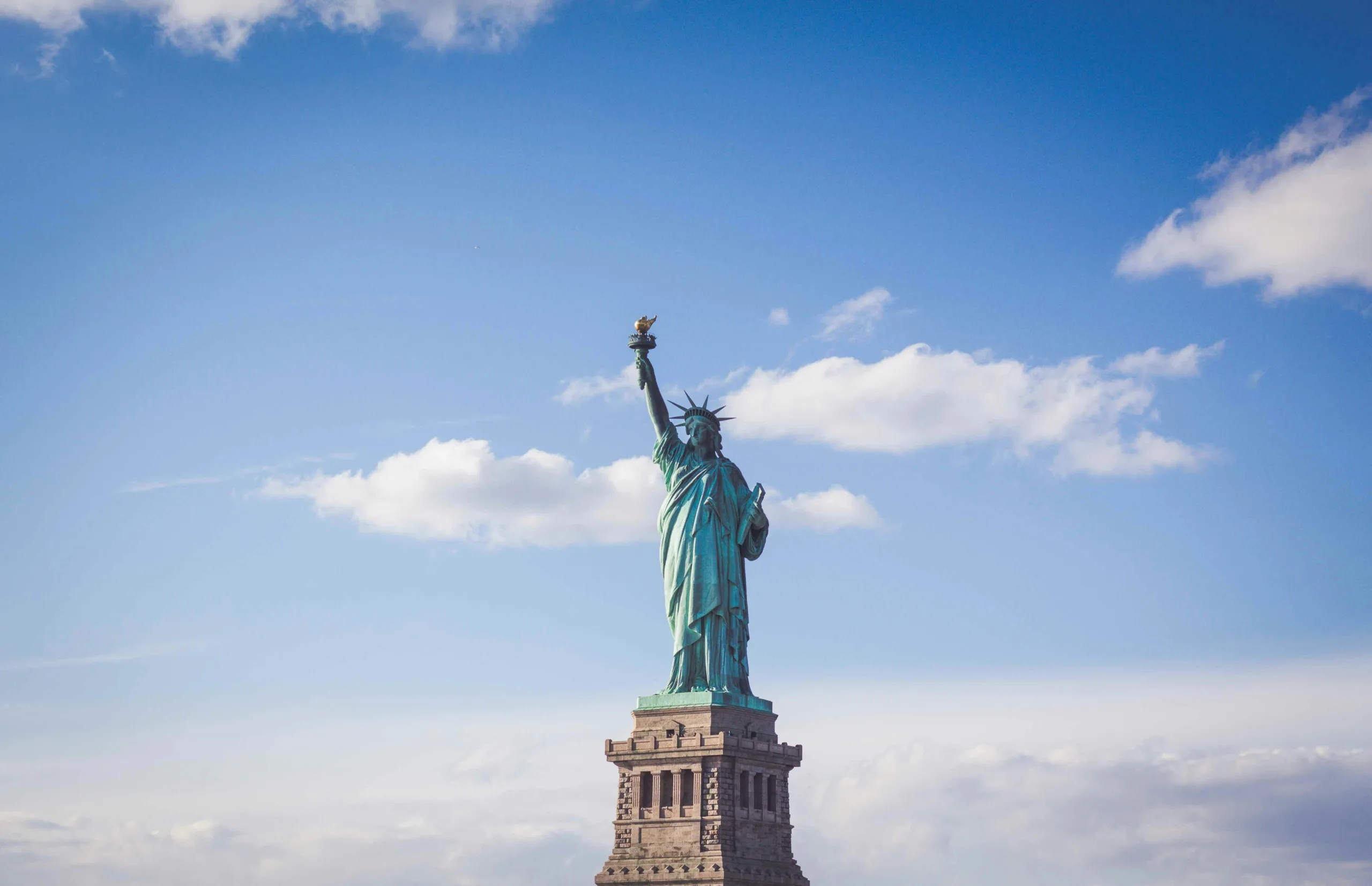 New York Statue of Liberty_ferdinand-stohr-PeFk7fzxTdk-unsplash-min